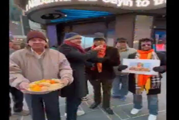 WATCH: Members Of Overseas Friends Of Ram Mandir Distribute Laddoos At Times Square