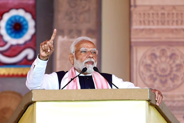 PM Modi, Guwahati, Assam, Narendra Modi, Maa Kamakhya, Himanta Biswa Sarma, IIT, IIM, Ujjwala Yojna, Swachh Bharat, Lakhpati Didi, Viksit Bharat 2047, Gauhati Medical College and Hospital, Narendra Modi in Assam, Modi in Assam, Modi Assam speech, PM Modi in Assam, Narendra Modi infrastructure project, culture, PM Modi