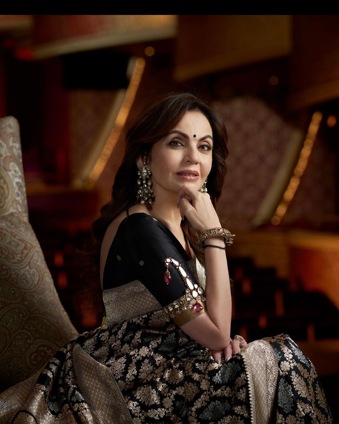 Nita Ambani looks gracious and elegant in banarasi saree and the royal bajubandh