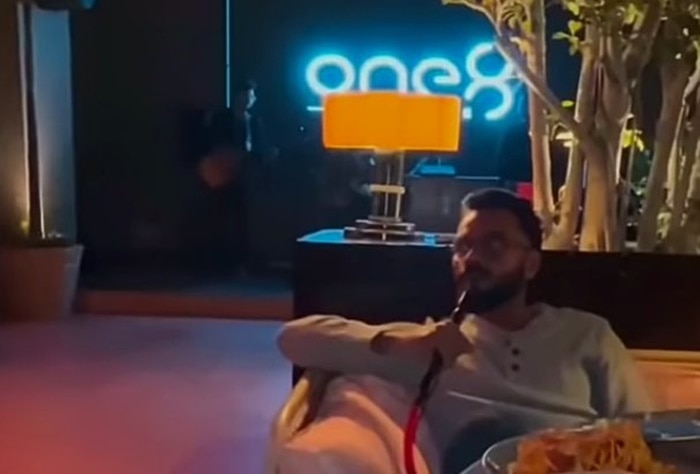 Virat Kohli CAUGHT Smoking Hookah? VIRAL VIDEO Sparks Controversy