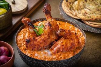 Delhi's Butter Chicken Delights: Top Spots to Explore