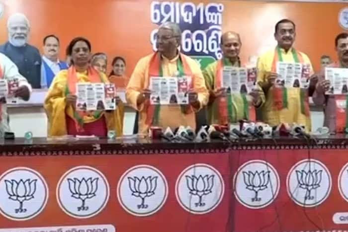 Odia, Sankalp Patra, BJP, Lok Sabha Manifesto, Bhubaneswar, Odisha, Lok Sabha Elections 2024, Vijaypal Singh Tomar, Manmohan Samal, Lakhpati didi, PM Awas Yojana, Ayushman Bharat Yojana, Narendra Modi, Amit Shah, Rajnath Singh, Viksit Bharat