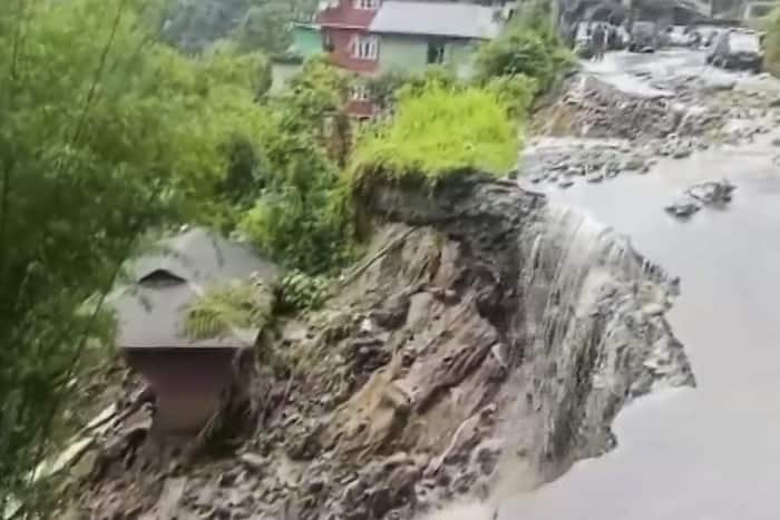 landslides blocked stretches of roads, several houses were inundated or damaged, and electricity poles were swept away.