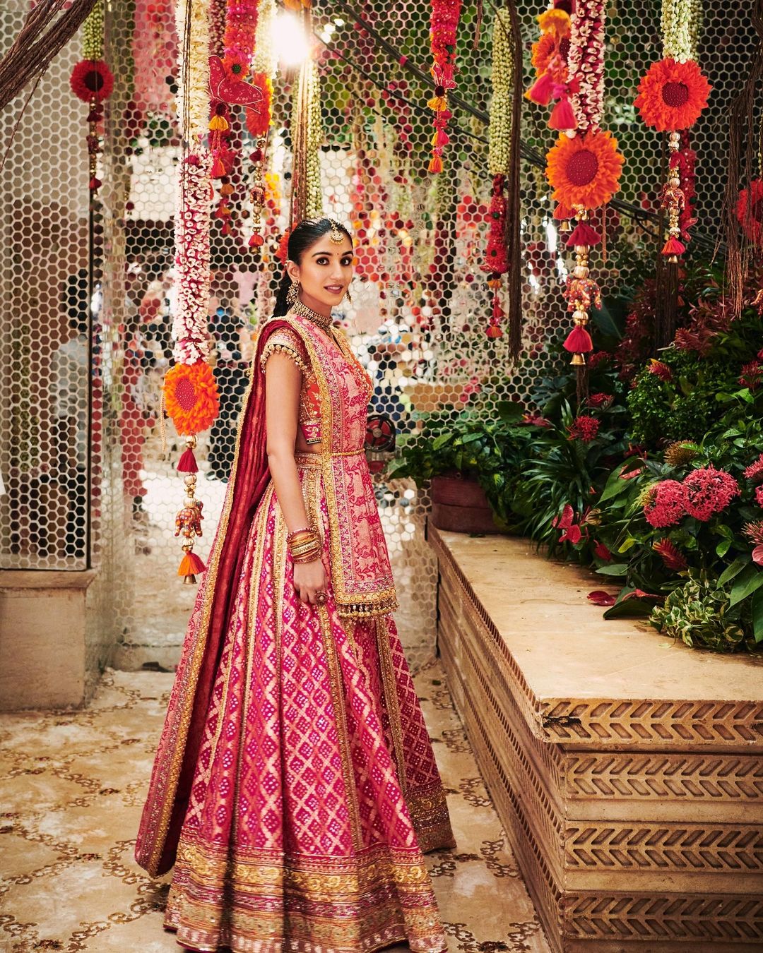 Radhika Merchant exudes elegance in rani pink bandhani lehenga (Manish Malhotra/Instagram)
