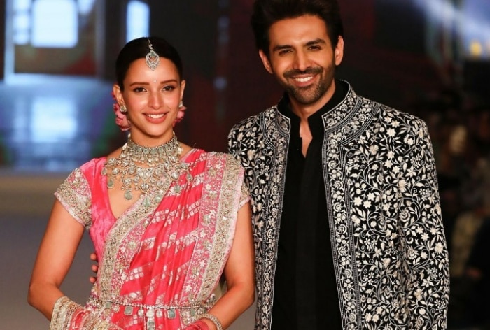 Triptii Dimri-Kartik Aaryan share unmissable chemistry as they walk the ramp in gulabi brocade lehenga and stylish black bandhgala