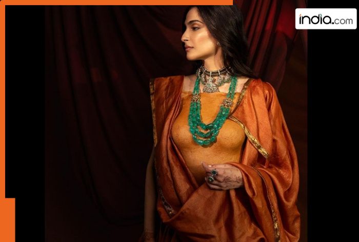 Sonam Kapoor’s styles orange lehenga not with a blouse but this mind blowing body ornament that is made of…