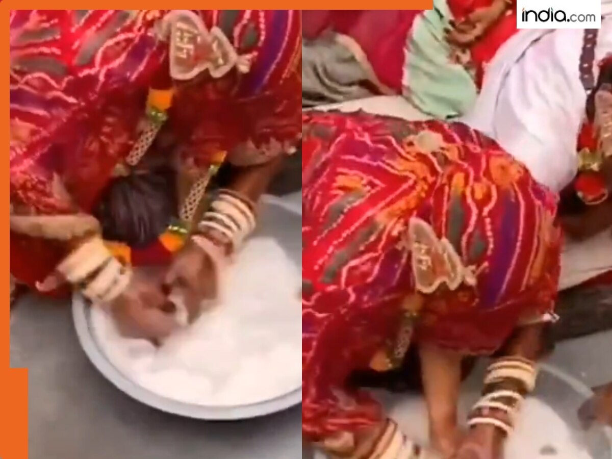 दूल्हा और दुल्हन अंगूठी पहले खोजने के लिए आपस में भिड़े