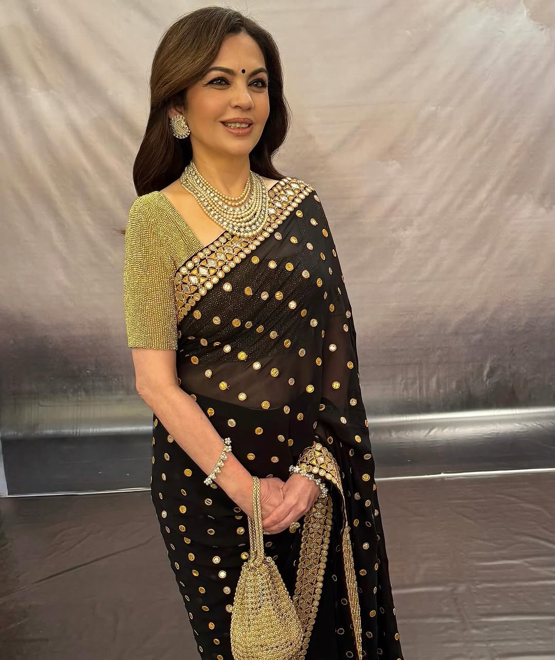 Nita Ambani in black mirror work saree at ABJSK store launch (Mickey Contractor/Instagram)