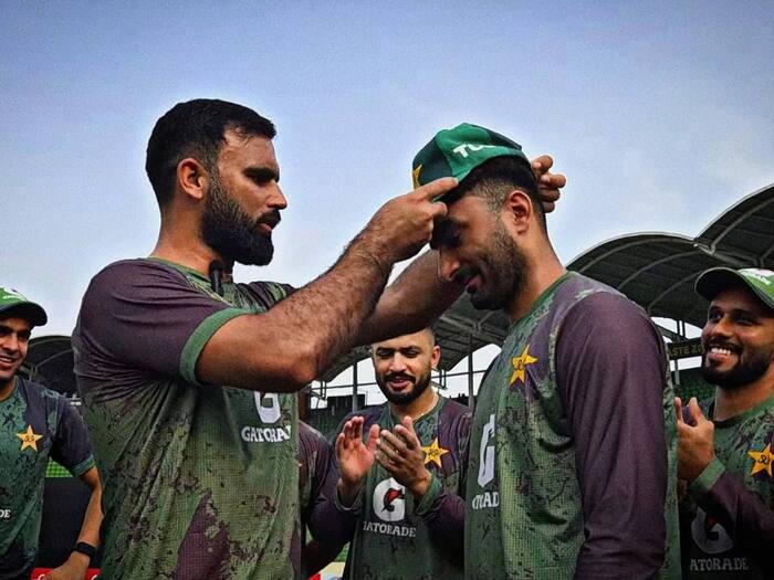 Salman Mirza receives his debut cap from Fakhar Zaman