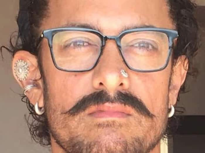 Bollywood actor ear piercin