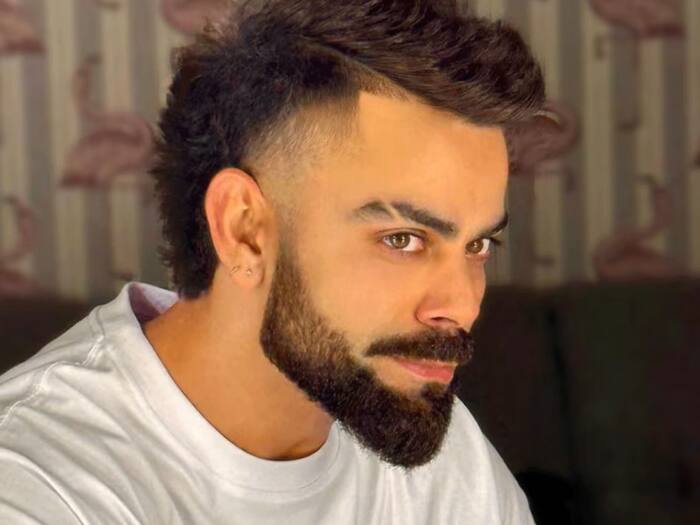 Virat kohli ear piercing