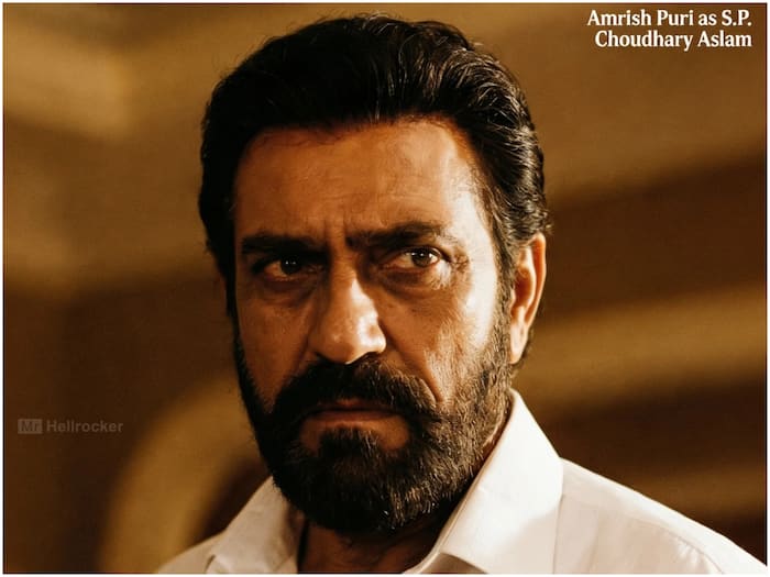 Amrish Puri as SP Aslam