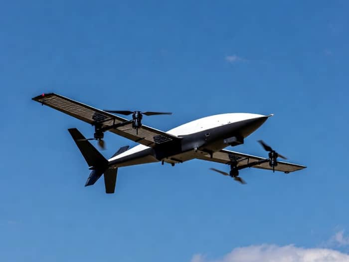 Drone flying in mountainous terrain