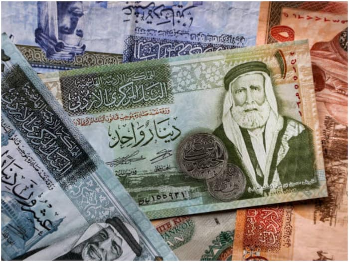 Jordanian dinars and US dollars in focus