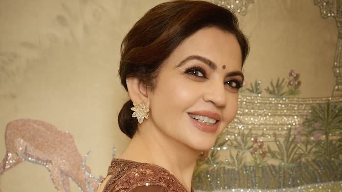 Nita ambani looks royal in jamdani tribal lore saree