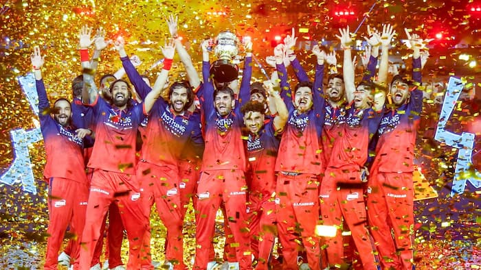 Who are the only three players to win the Indian Premier League (IPL) title three times in a row?