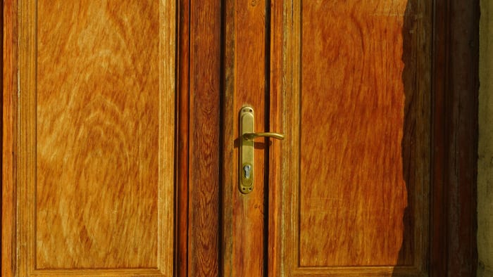 How to fix swollen wood door